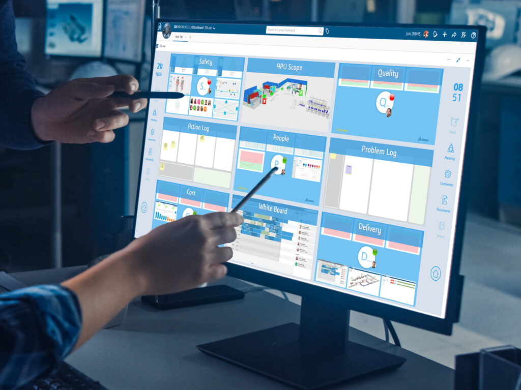 Engineer Working on Desktop Computer, Screen Showing CAD Softwar